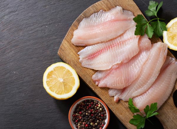 Fresh,Fish,Fillet,Of,Tilapia,With,Ingredients,For,Cooking,On